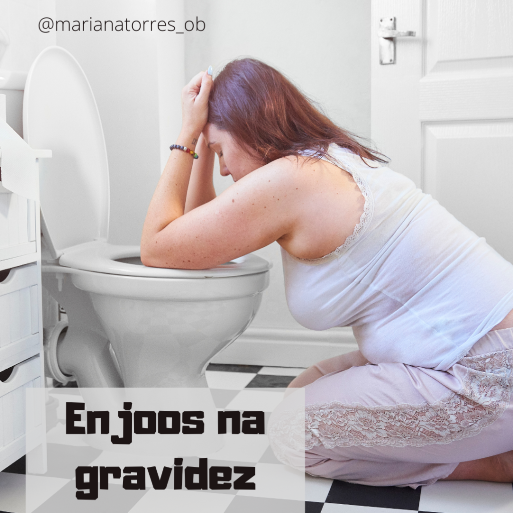 gravida enjoada debruçada numa sanita
